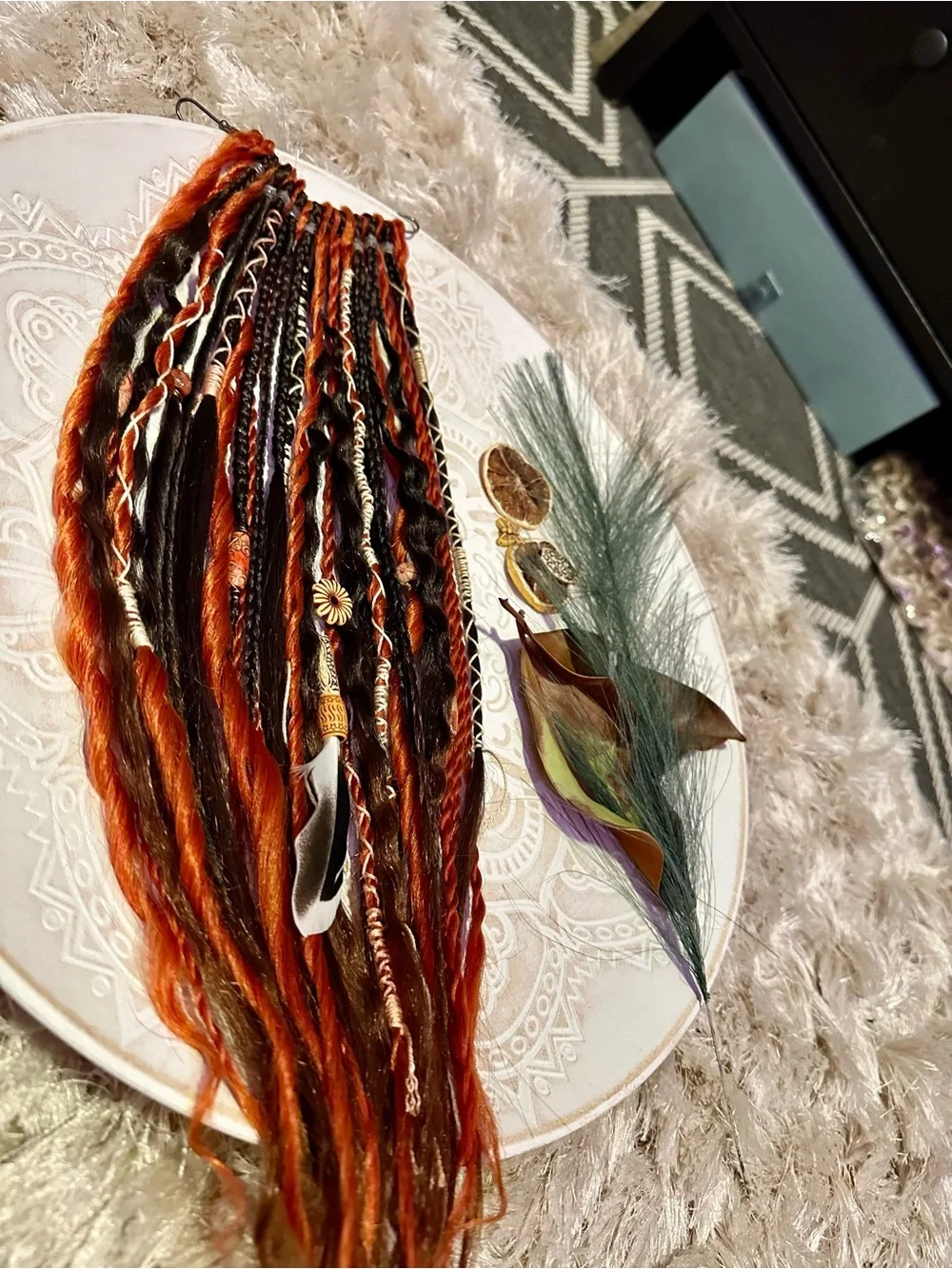 Blonde Hair Extensions with Black and Orange Braided Accents